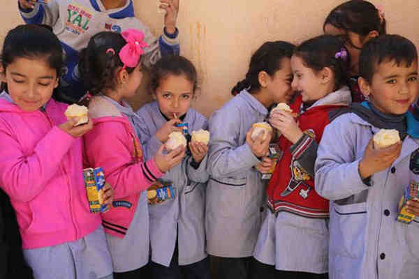WFP launches school meals programme, which supports both Lebanese and Syrian children attending public primary schools across Lebanon. Photo: WFP / Dina El Kassaby