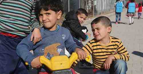 On 16 January 2017, boys racing their tricycles in Nizip 1 refugee camp, Gaziantep, southern Turkey. Nizip 1 camp is home to over 10,000 Syrian refugees, including more than 5,000 children. Photo: UNICEF